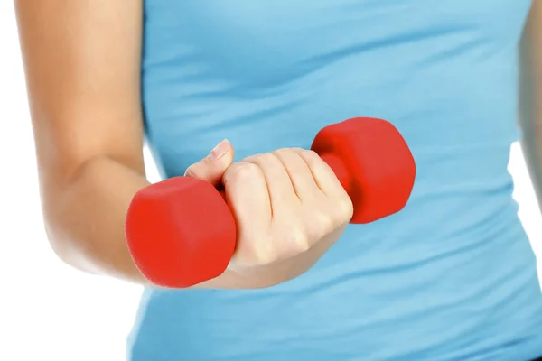 Female hand with a red barbell — Stock Photo, Image