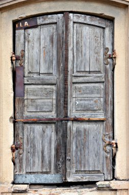 Old timeworn doors. clipart