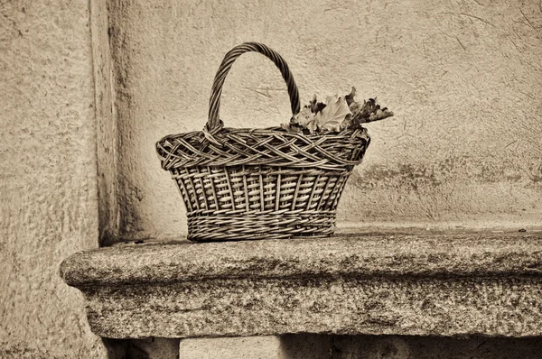 stock image Wicker basket on a bench