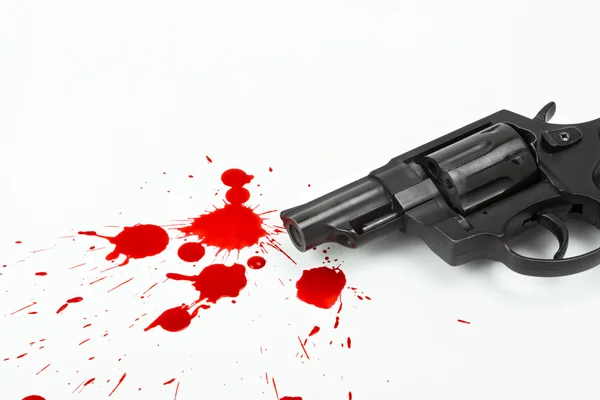 Pistola y sangre — Foto de Stock