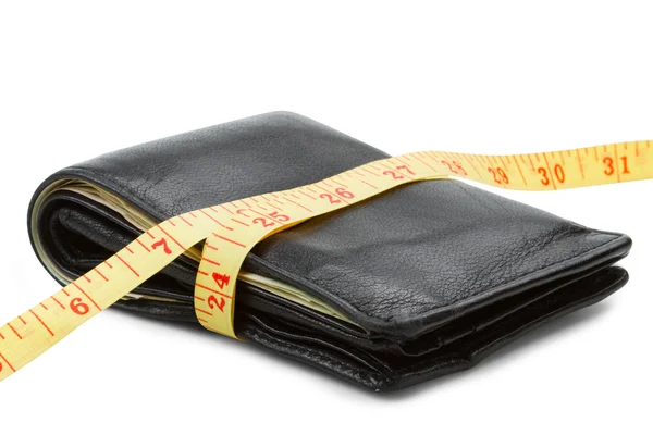 Wallet with yellow tape measure — Stock Photo, Image