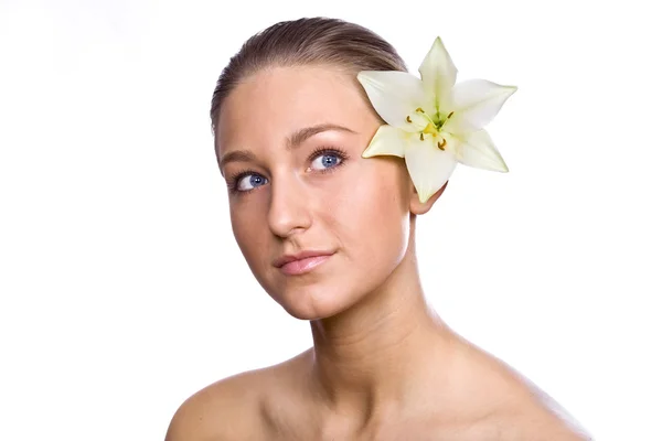 Flicka med en blomma-Lilja — Stockfoto