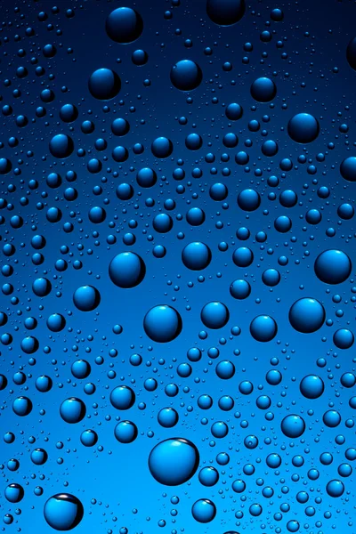 Krople wody na niebiesko — Zdjęcie stockowe