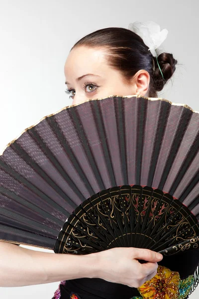 Closeup portrait of flamenco dancer with fan — Stock Photo, Image