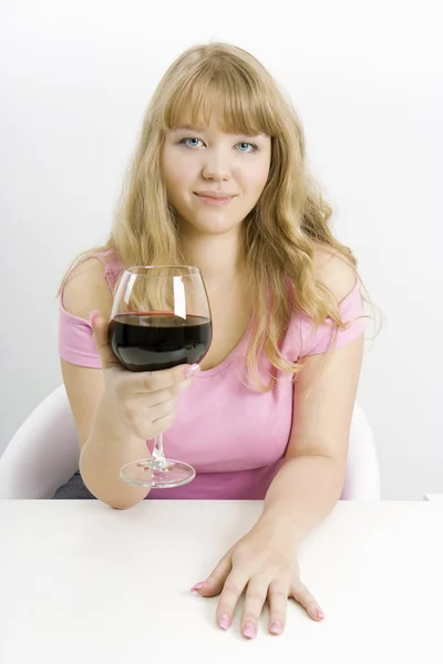 Blonde with a big glass — Stock Photo, Image