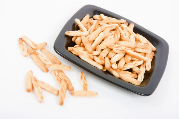 Salted sticks on a plate. appetizer — Stock Photo, Image