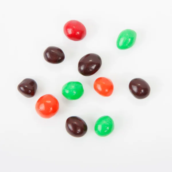 Noix en glaçage chocolat multicolore — Photo
