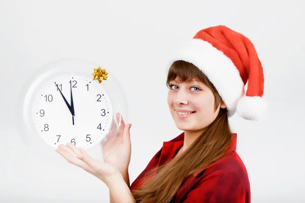 Attractive girl with a clock — Stock Photo, Image