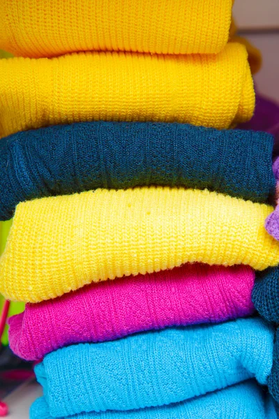 Pile of bright colored tights for children — Stock Photo, Image
