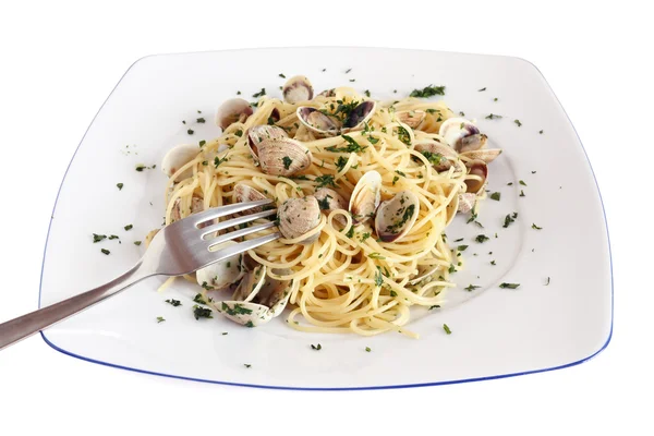 Eating spaghetti with clams — Stock Photo, Image