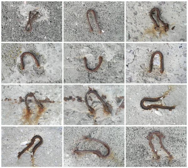 stock image Iron loop in cement block.