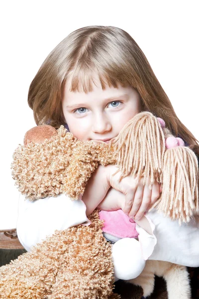 Menina com brinquedos — Fotografia de Stock