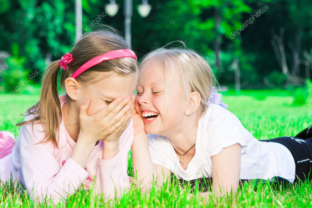 Two cute girls laughing