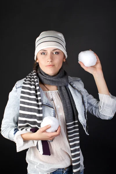A woman with snowballs — Stock Photo, Image