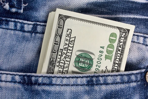 Деньги джинсы — стоковое фото