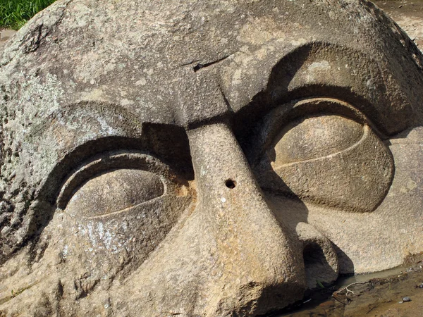 stock image Stone head in park