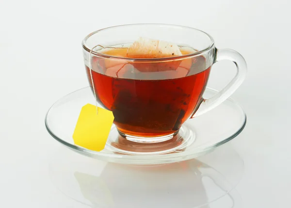 Xícara com chá e teabag — Fotografia de Stock