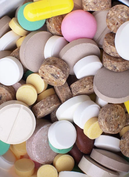 Högen av färgade tabletter — Stockfoto