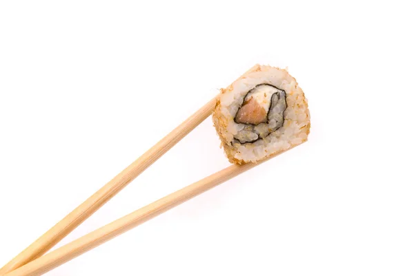 Sushi con bacchette isolate su fondo bianco — Foto Stock