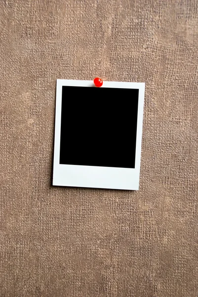 Blank photo frame on a wall — Stock Photo, Image