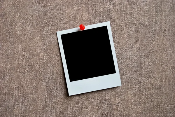 Blank photo frame on a wall — Stock Photo, Image