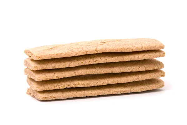 Pequeno pão de pão em um fundo branco — Fotografia de Stock