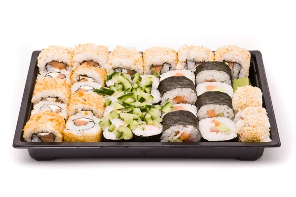 Sushi na caixa isolado em um fundo branco — Fotografia de Stock