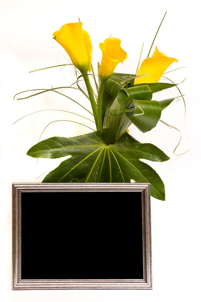 Beautiful bouquet of callas and silver frame on a white — Stock Photo, Image