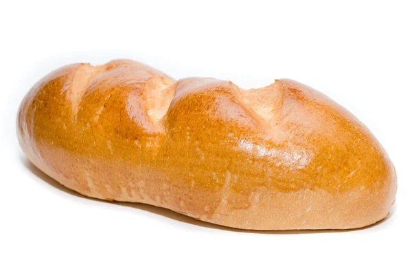 Long loaf on a white background. — Stock Photo, Image