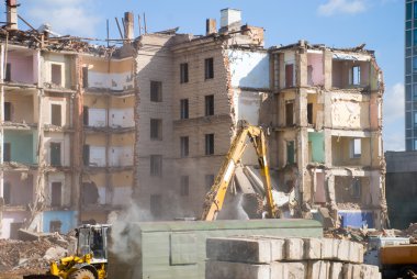 Demolition of building in smoke clipart