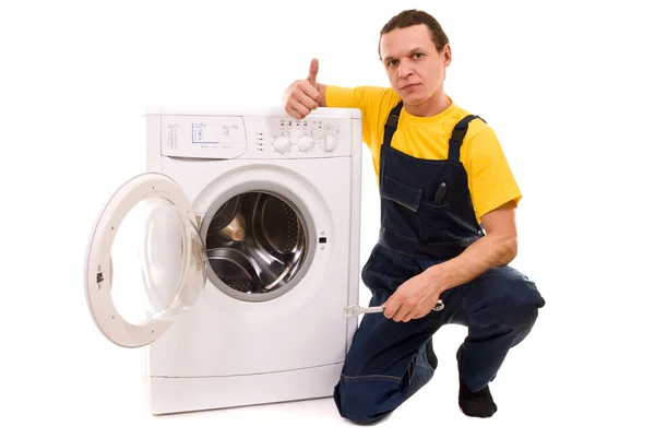 Tamirci ve çamaşır makinesi beyaz zemin üzerine izole — Stok fotoğraf