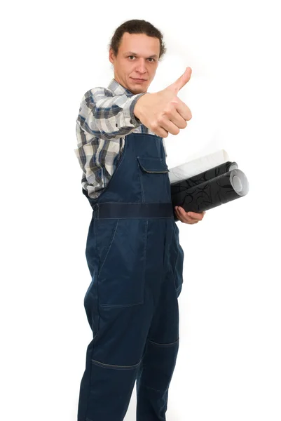Trabalhador com papéis de parede em mãos sobre fundo branco — Fotografia de Stock
