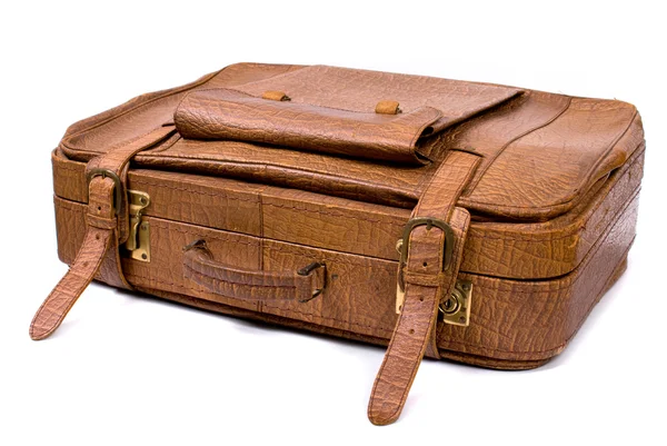 白色底座上的旧行李箱 — 图库照片