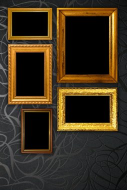 Gold frame on black vintage wallpaper background clipart