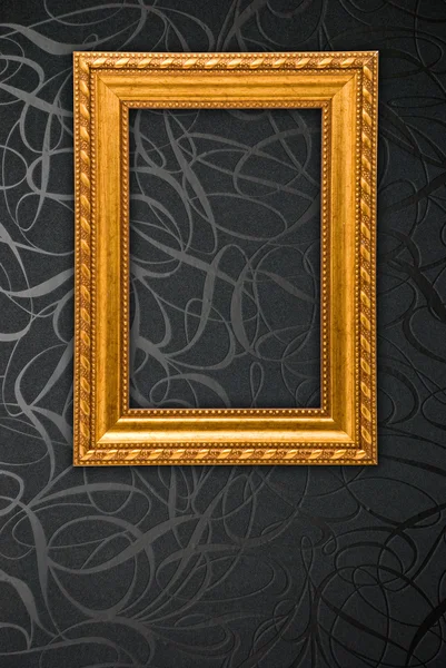 Gold frame on black vintage wallpaper background — Stock Photo, Image