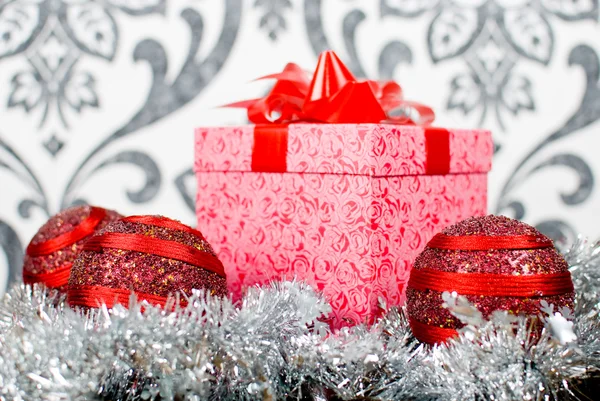 Christmas gift box with christmas balls — Stock Photo, Image