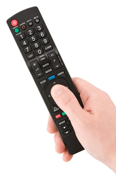 Hand with TV remote control — Stock Photo, Image