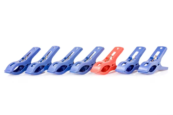 Clothes pegs in a row — Stock Photo, Image