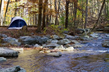 Camping By Mountain Stream clipart
