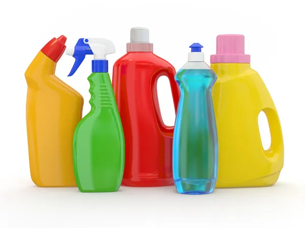 Bottiglie detergenti diverse su sfondo bianco — Foto Stock