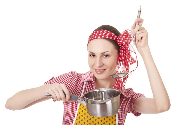Kepçe ve pan ile oynak ev kadını — Stok fotoğraf