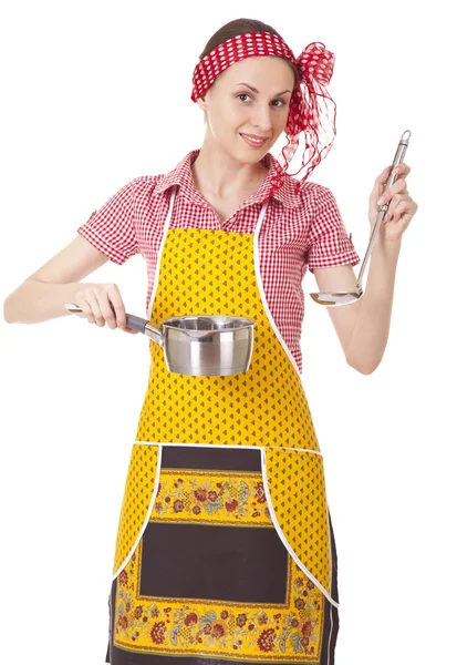 Dona de casa brincalhão com concha e panela — Fotografia de Stock