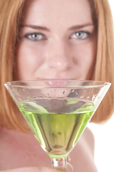 Andere gezicht in glas met alcohol — Stockfoto