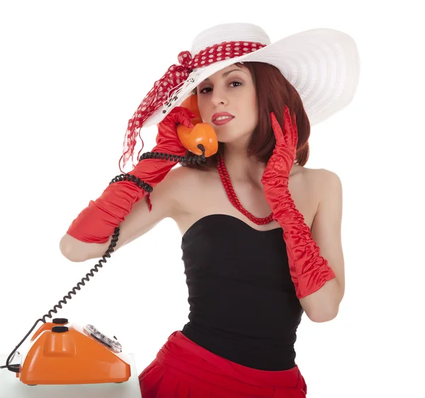 Chica de moda en estilo retro con teléfono vintage — Foto de Stock