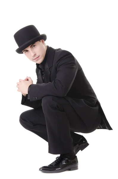 Homem de terno preto austero e chapéu — Fotografia de Stock