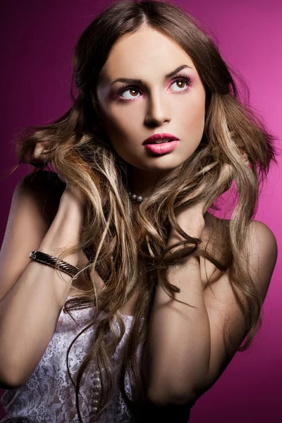 Fashionable woman on pink background — Stock Photo, Image