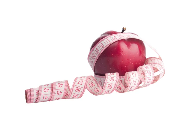 Elma ve bir ölçüm bandı — Stok fotoğraf