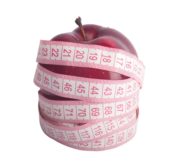Elma ve bir ölçüm bandı, — Stok fotoğraf