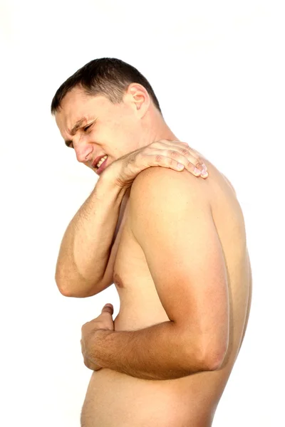 Mladý muž s bolest ramene — Stock fotografie