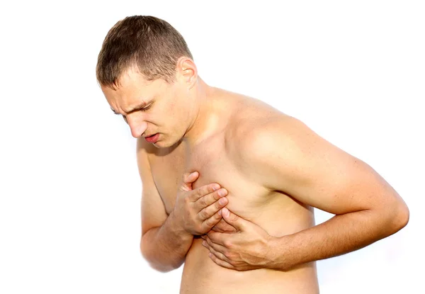 Junger Mann erleidet Herzinfarkt — Stockfoto